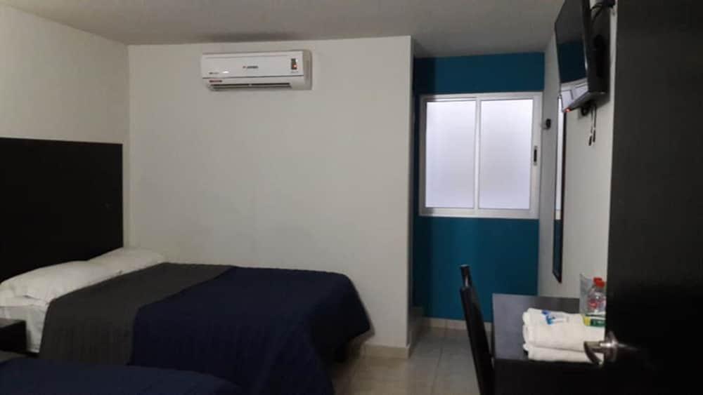 Hotel Flores Guamuchil Bagian luar foto