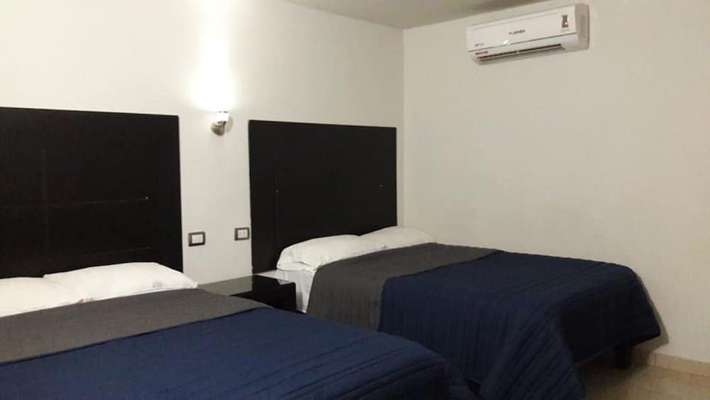 Hotel Flores Guamuchil Bagian luar foto